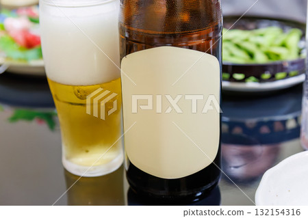 A toast with beer. Dinner at a grilled offal restaurant. Shimoda City, Shizuoka Prefecture - 2025 132154316