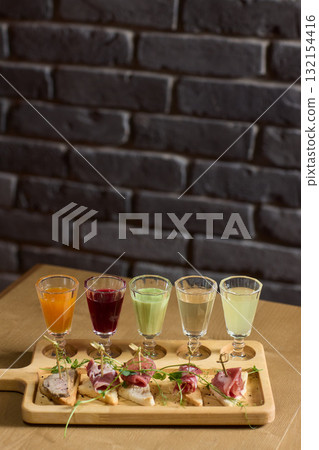 Enjoy artisan crafted cocktails paired with a delightful charcuterie board experience 132154416