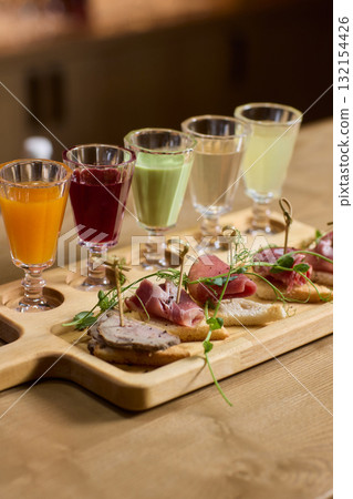 Enjoy artisan crafted cocktails paired with a delightful charcuterie board experience Enjoy artisan crafted cocktails paired with a delightful charcuterie board experience 132154426