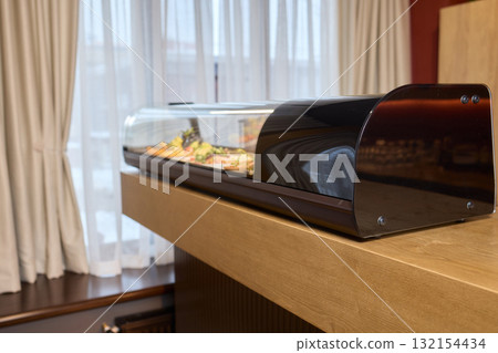 A Variety of Delicious Dishes Are Beautifully Displayed in the Restaurants Bar Area A Variety of Delicious Dishes Are Beautifully Displayed in the Restaurants Bar Area 132154434