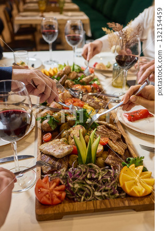 An Elegant Dining Experience Featuring a Lavish Feast of a Wide Variety of Dishes An Elegant Dining Experience Featuring a Lavish Feast of a Wide Variety of Dishes 132154459