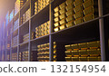 Generic gold reserve vault with stacks of gold bars. Bank vault with gold and cash. 3d rendering 132154954