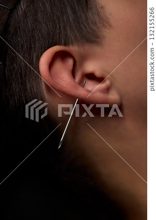Professional Piercing Process A detailed closeup view showcasing the art of Ear Piercing 132155266