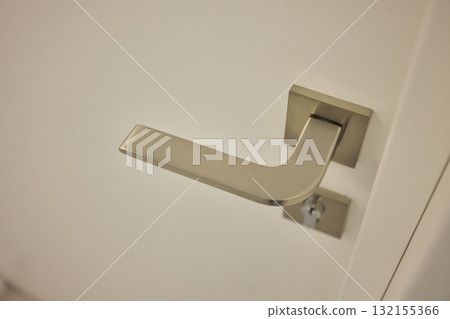 Sleek and Modern Door Handle Featuring an Innovative Locking Mechanism for Enhanced Security 132155366