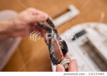 Properly Removing and Maintaining the Brush of a Cleaning Robot for Optimal Performance 132155465