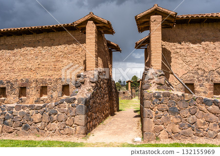 Ancient Ruins of Raqchi in the Peruvian Highlands Under Clouds 132155969
