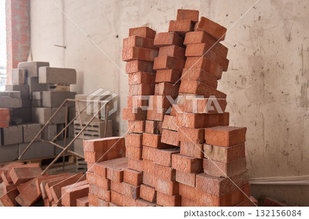 A closeup image of Stacked Bricks showcased in a dynamic Construction Environment 132156084
