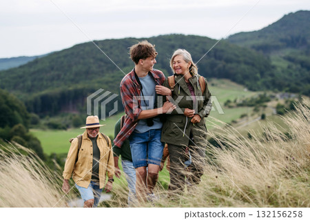 Grandmother and teen boy on hike trip. 132156258
