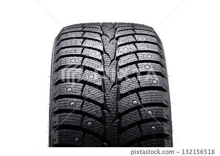 Winter studded tire details close-up. Front view, isolate on a white background. A mock-up for the sale of winter tires with seasonal design changes 132156518