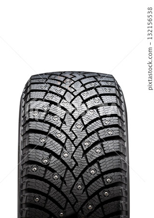 Studded winter tire designed for improved traction and safety on snowy and icy roads in cold weather conditions Studded winter tire designed for improved traction and safety on snowy and icy roads in cold weather conditions 132156538