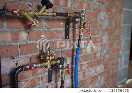 The process of Industrial Plumbing Installation involving the use of Brass Valves and Pipes The process of Industrial Plumbing Installation involving the use of Brass Valves and Pipes 132156988