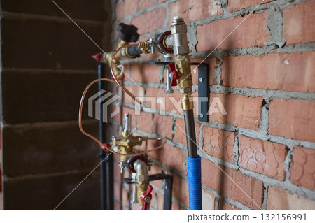 The process of Industrial Plumbing Installation involving the use of Brass Valves and Pipes 132156991