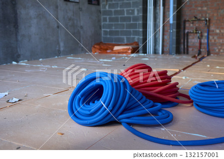 Vibrantly Colored Coiled Hoses Ideal for Plumbing Needs or Electrical Applications 132157001