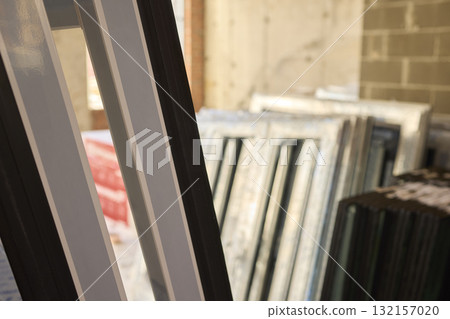 Stacked window frames are now fully prepared and ready for the upcoming installation process 132157020