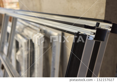 Stacked window frames are now fully prepared and ready for the upcoming installation process 132157027