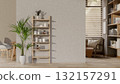Wooden shelf with cups and seasoning and potted plant at the wall between study corner and corridor. 132157291