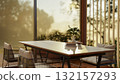 A coffee cup and books on wooden table with steel armchairs in dining hall of a restaurant or cafe. 132157293