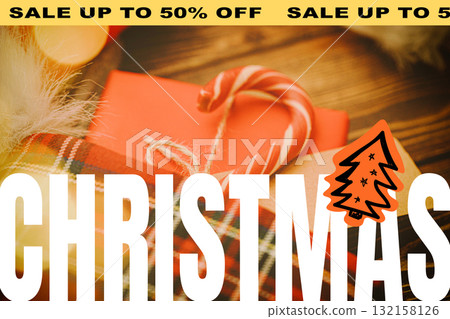 Christmas sale with gifts and decorations on a wooden table Christmas sale with gifts and decorations on a wooden table 132158126