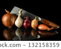 Fresh organic onions in different colors and sizes with sharp kitchen cleaver, ideal for healthy cooking and recipe concepts 132158359
