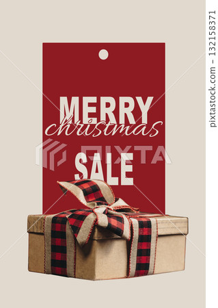 Holiday gift package with Merry Christmas sale tag for seasonal promotions Holiday gift package with Merry Christmas sale tag for seasonal promotions 132158371