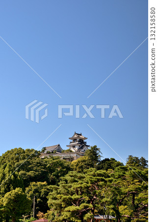 Under a clear, cloudless sky, Kochi Castle stands tall on a hill, one of the castle towers still standing. Under a clear, cloudless sky, Kochi Castle stands tall on a hill, one of the castle towers still standing. 132158580