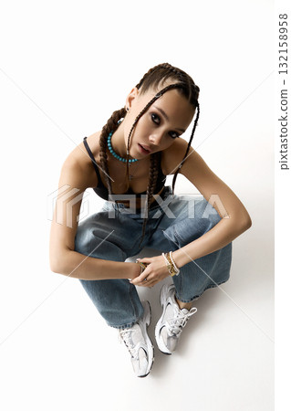 beautiful girl with braids. pretty young woman with tressed hairstyle beautiful girl with braids. pretty young woman with tressed hairstyle 132158958