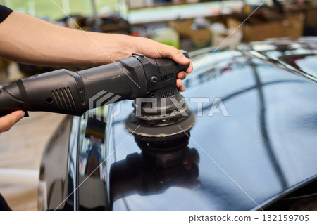 Expert and Professional Car Polishing Using Precision Tools for Exceptional Results 132159705