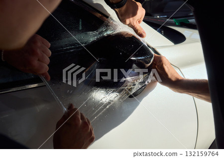 Applying a quality protective film on a vehicle is essential for longlisting surface protection Applying a quality protective film on a vehicle is essential for longlisting surface protection 132159764