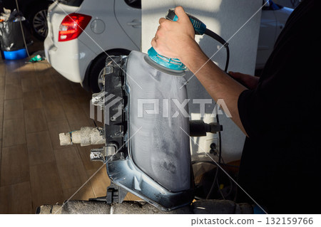 Experience the Art of Professional Car Detailing with a Polishing Tool in Action Today Experience the Art of Professional Car Detailing with a Polishing Tool in Action Today 132159766
