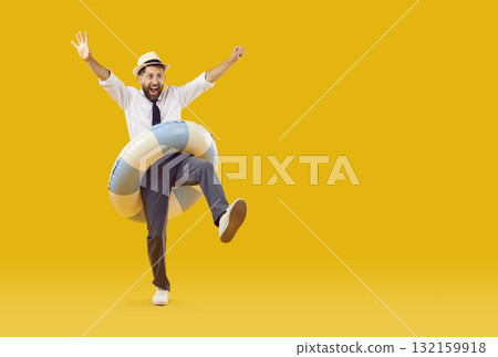 Happy, joyful, excited male office worker having fun on summer holiday at the beach Happy, joyful, excited male office worker having fun on summer holiday at the beach 132159918