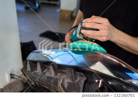 Experience the Art of Professional Car Detailing with a Polishing Tool in Action Today Experience the Art of Professional Car Detailing with a Polishing Tool in Action Today 132160701