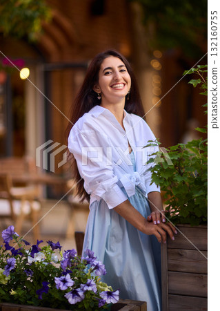 Elegant Outdoor Fashion A Stylish Woman Looking Fabulous in a Casual Yet Chic Look Elegant Outdoor Fashion A Stylish Woman Looking Fabulous in a Casual Yet Chic Look 132160755