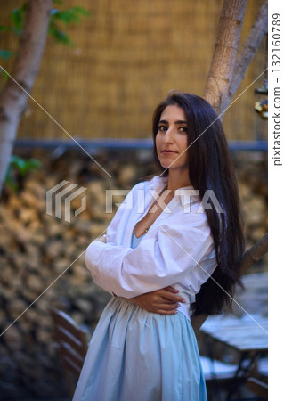 Elegant Outdoor Fashion A Stylish Woman Looking Fabulous in a Casual Yet Chic Look 132160789