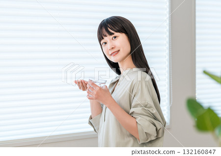 Sick woman taking oral medication, supplements, medicines, medication 132160847