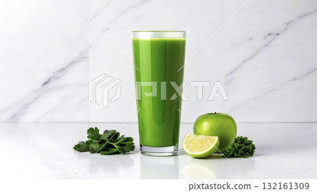 Green juice with fresh ingredients sits on a marble counter beside an apple and lime Green juice with fresh ingredients sits on a marble counter beside an apple and lime 132161309