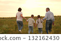 Happy family girl boy mother father walking field , Parents and children enjoying sunset together, Family girl boy mother father bonding outdoors, Family time nature, Togetherness love countryside 132162430