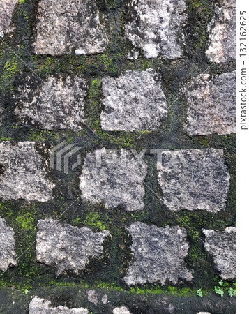 Old stone wall texture with moss background Old stone wall texture with moss background 132162625