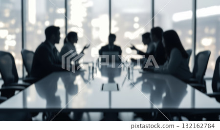 Defocused image of boardroom with team having negotiation, professional workplace interior with city lights view, corporate strategy and teamwork with copy space 132162784
