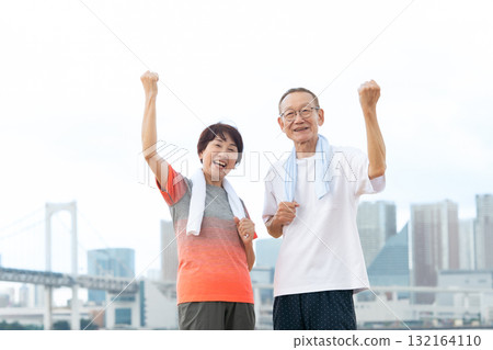Senior couple portrait fist pump Senior couple portrait fist pump 132164110