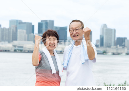 Senior couple portrait fist pump Senior couple portrait fist pump 132164160