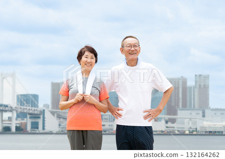 Senior couple portrait blue sky Senior couple portrait blue sky 132164262