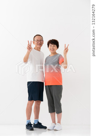 Senior couple fitness whole body peace Senior couple fitness whole body peace 132164279