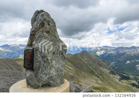 Memorial stone at Col de la Bonette in French Alps Memorial stone at Col de la Bonette in French Alps 132164916