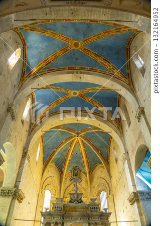 Church interior with painted vaulted ceiling in Massa Marittima 132164952