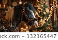 Horse adorned with festive decorations standing near Christmas tree in cozy setting 132165447