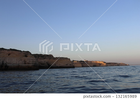 Sunlit Coastal Cliff in Algarve, Portugal Sunlit Coastal Cliff in Algarve, Portugal 132165989