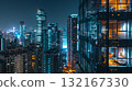 Night skyscrapers and warm office lights seen through the windows 132167330