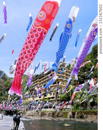 Tourists taking photos at the Tsuetate Onsen Carp Streamer Festival (Oguni Town, Kumamoto Prefecture) Tourists taking photos at the Tsuetate Onsen Carp Streamer Festival (Oguni Town, Kumamoto Prefecture) 132167602