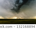 Dark clouds developing lightning strike overhead dramatic view 132168894