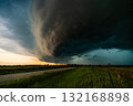 Dramatic storm quickly moves across fields and farm land bringing heavy wind and rain 132168898
